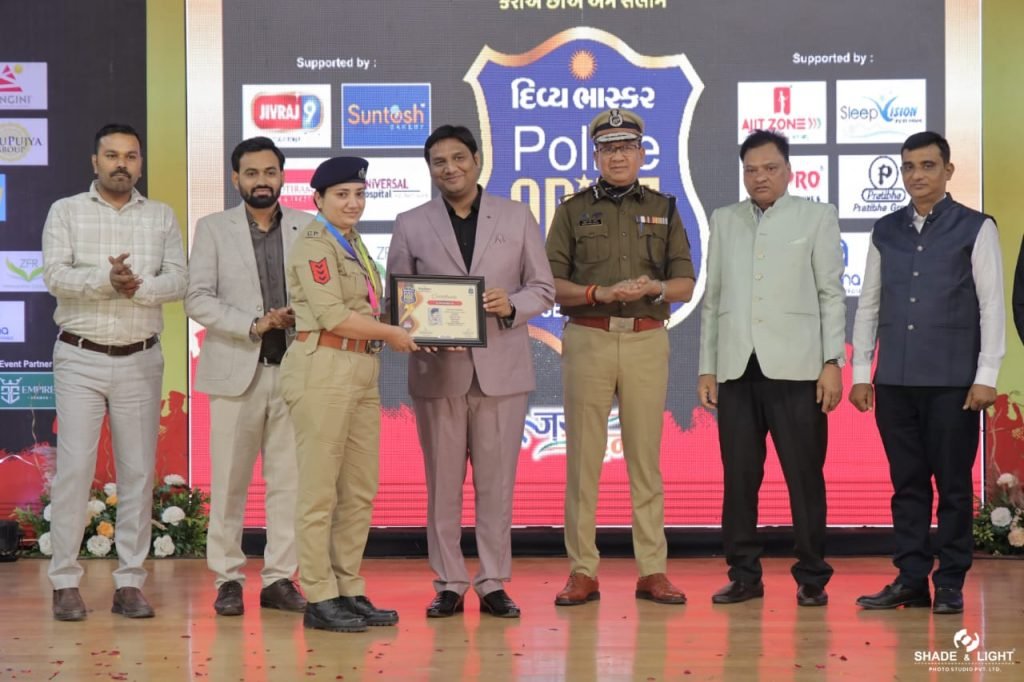 SleepVision Mattresses advertisement at Surat Police Pride Award ceremony